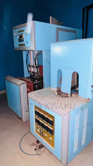 Bottle Blowing Machine with Chiller - Twin Cavity
