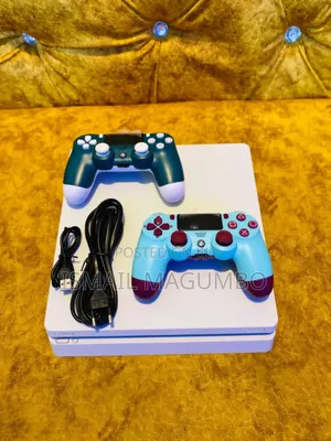 Playstation 4 Fat with 2 Controllers & 4 Games
