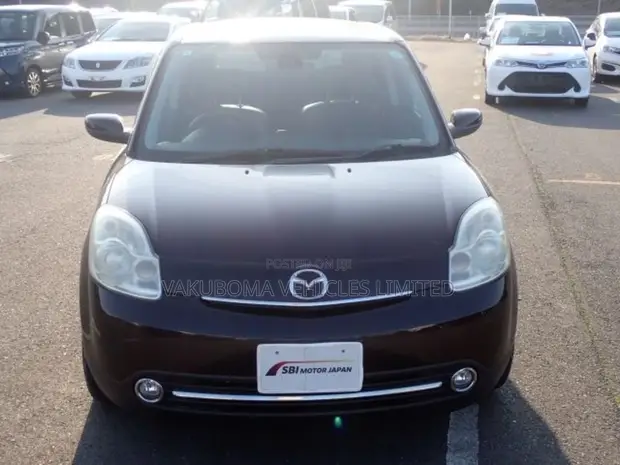 Mazda Verisa 2009 Zambarau - 1