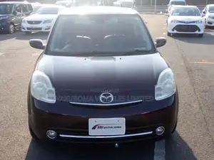 Mazda Verisa 2009 Zambarau
