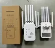 Long Range 300Mbps WiFi Extender Repeater Access Point Dual Band - 1
