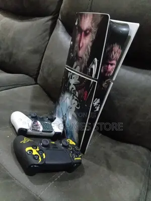 PS5 Slim Complete Set - 2 Controllers, 7 Games