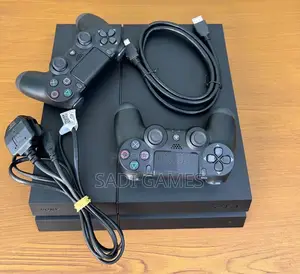PS4 Fat Console with 2 Controllers & Games