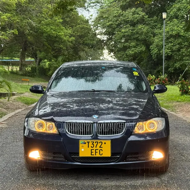 BMW 3 Series 325i RWD 2010 Bluu - 1