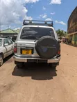 Toyota Land Cruiser VX 1999 Nyeupe - 4
