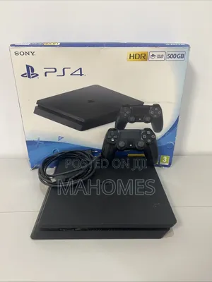 Used PS4 Slim UK 500GB with 2 Controllers & 5 Games