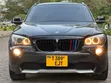 BMW X1 2010 Nyeusi - 4