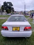 Toyota Carina 1999 Nyeupe - 1