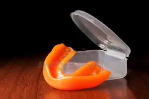 Orange Boil and Bite Sports Mouthguard with Carry Case