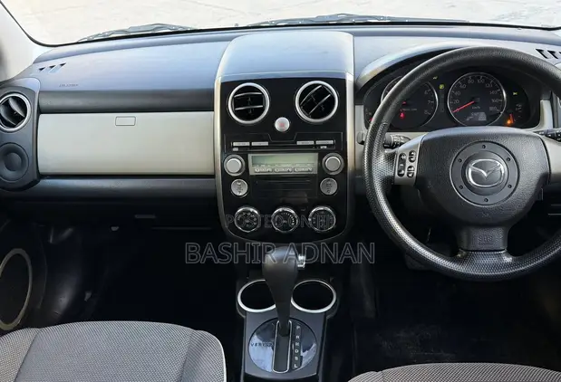 Mazda Verisa 2011 Kijivu - 1