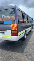 Toyota Coaster 2003 Nyeupe - 1