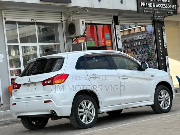 Mitsubishi RVR 2009 White - 1