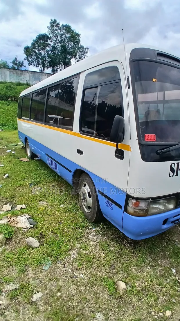 Toyota Coaster 1999 White - 1