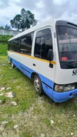 Toyota Coaster 1999 White - 1