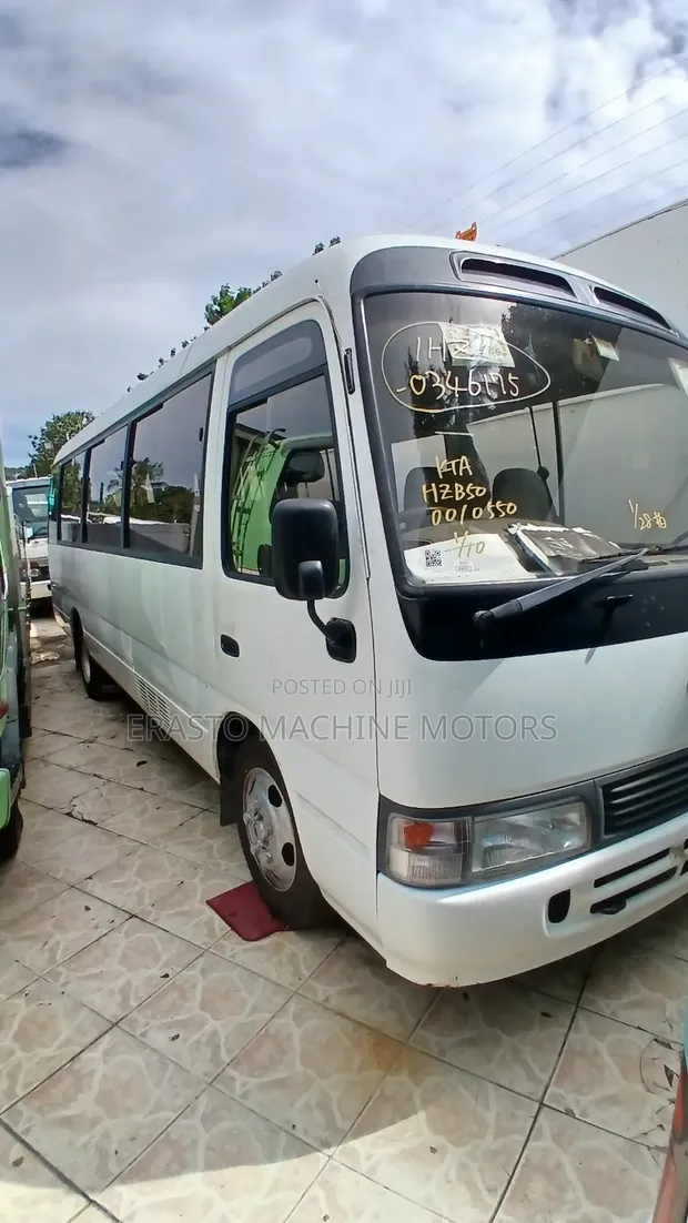 Toyota Coaster Bus 2004 White - 1