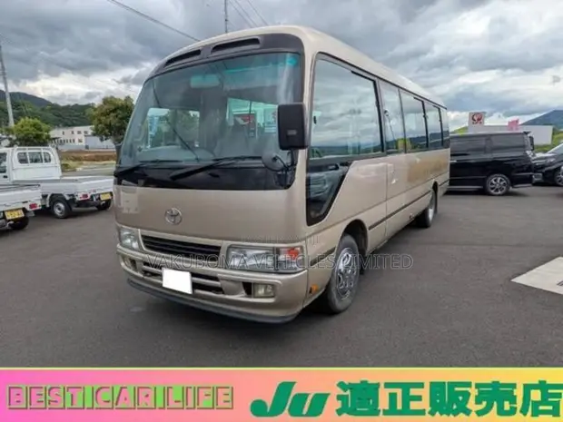 Toyota Coaster Bus 2006 Gold - 1