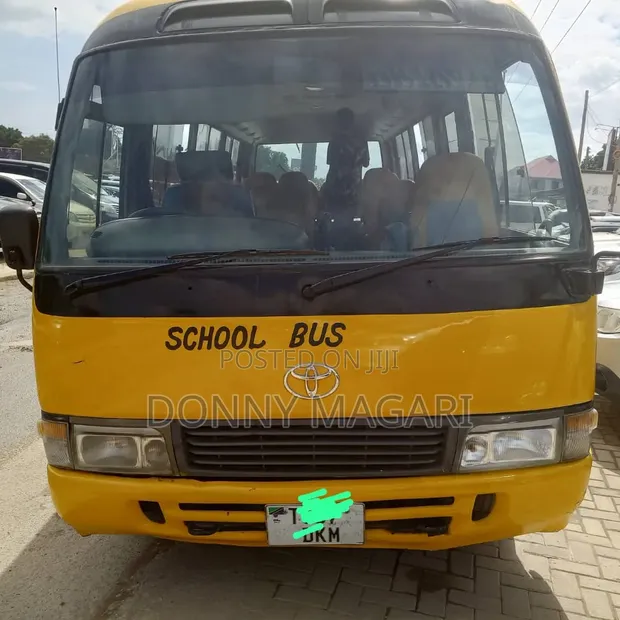 Toyota Coaster 2002 Yellow - 1