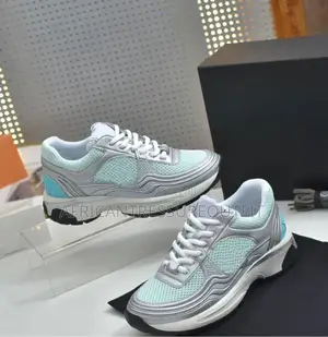 Chanel Silver Metallic CC Logo Sneakers