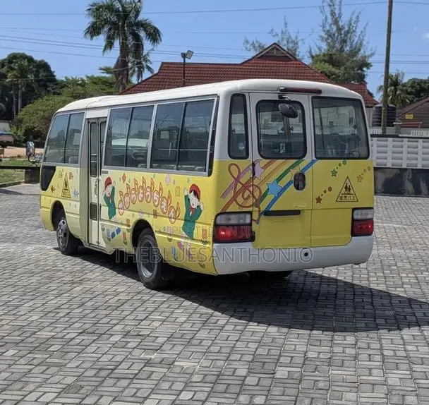 Toyota Coaster 2004 Yellow - 1
