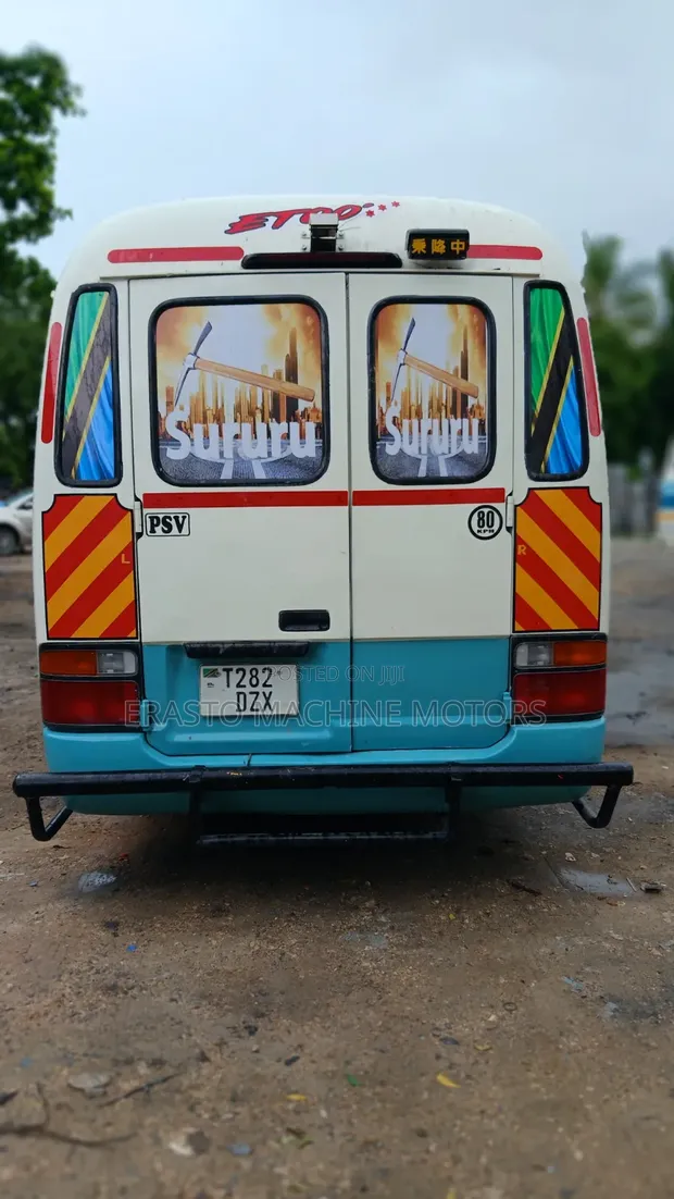Toyota Coaster 1999 Beige - 1