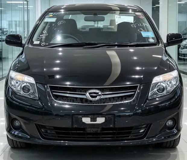 Toyota Corolla Fielder 2010 Nyeusi Metallic - 1
