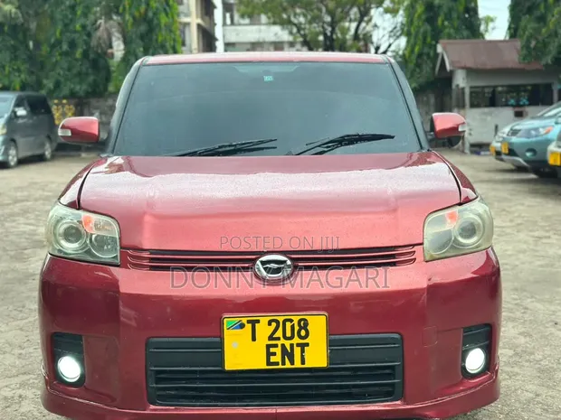 Toyota Corolla Rumion 2009 Maroon - 1