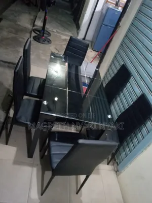 Dining Table with 6 Black Glass Chairs