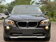 BMW X1 2012 Nyeusi - 1