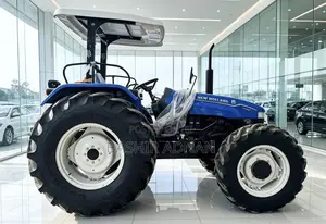 New Holland TT75 Tractor with Plough