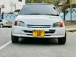 Toyota Starlet 2004 White - 1