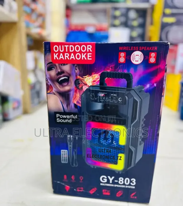 GY-803 Portable Rechargeable Speaker with Wireless Microphone - 1