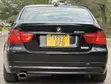 BMW 3 Series 320i RWD 2010 Nyeusi - 1