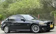 BMW 3 Series 320i RWD 2010 Nyeusi - 4
