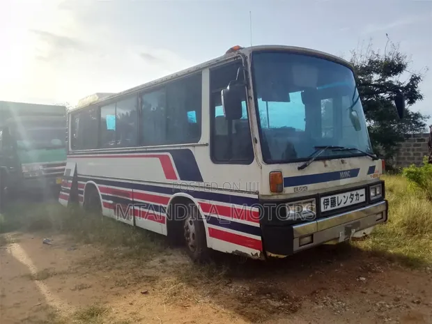 Toyota Coaster 2003 - Nyeupe - 1