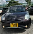 Mazda Verisa 2010 Maroon - 1
