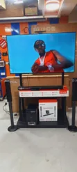 TCL 65" 4K UHD Smart TV with Aiwa 800W Wireless Subwoofer - 2