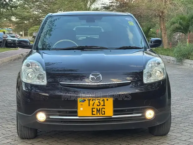 Mazda Verisa 2010 Brown - 1