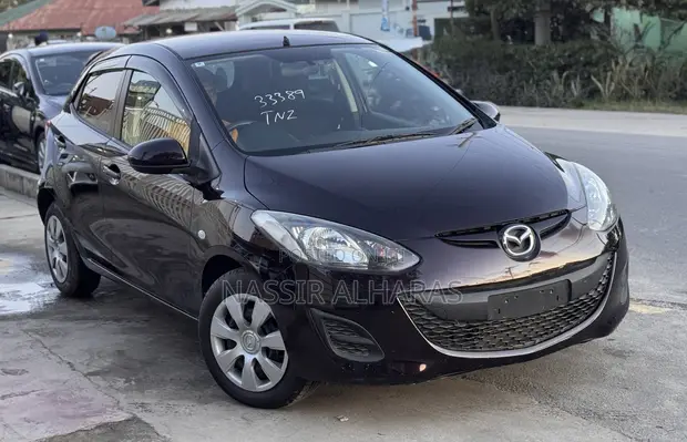 Mazda Demio 2012 Maroon - 1
