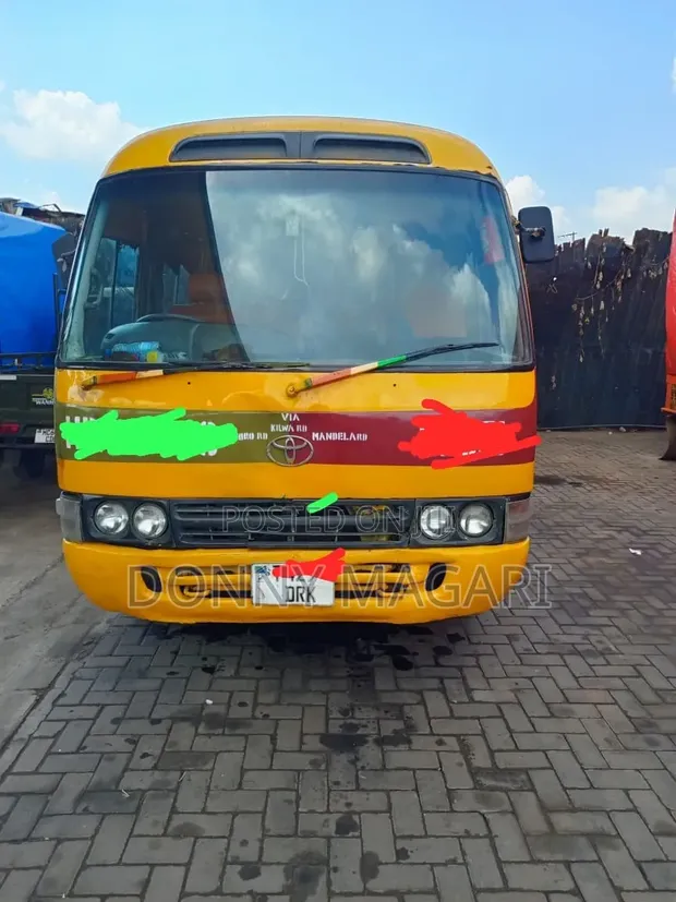 Toyota Coaster 2002 - Yellow - 1