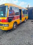 Toyota Coaster 2002 - Yellow - 2