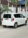 Toyota Ractis 2010 Pearl White - 2