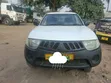 Mitsubishi L200 2009 White - 1