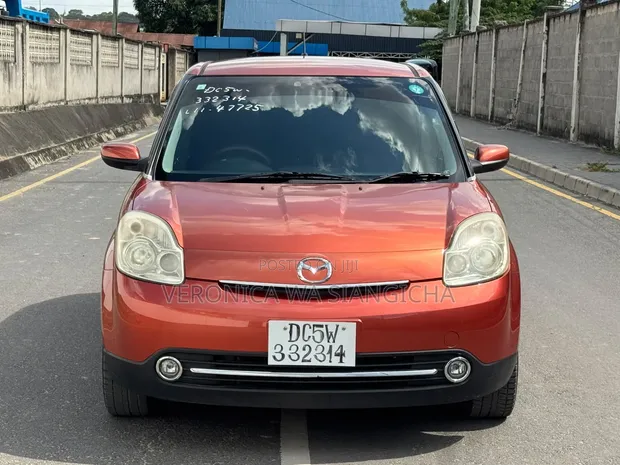 Mazda Verisa 2010 Nyekundu - 1