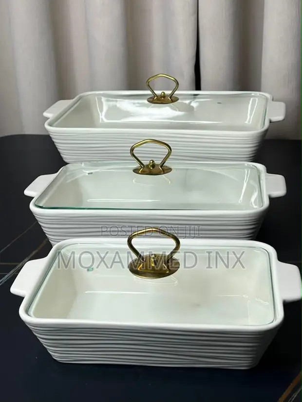 Stack of 3 White Ribbed Ceramic Casserole Dishes with Glass Lids - 1