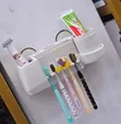Dispenser Toothbrush Holder - 1