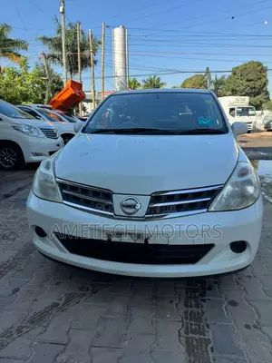 Nissan Tiida 2009 White Pearl