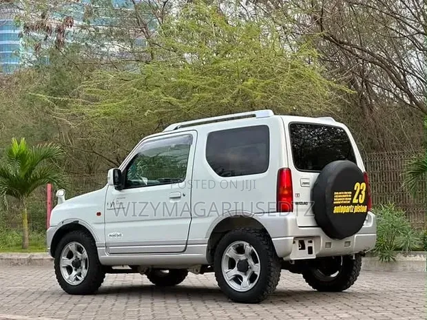 2003 Suzuki Jimny Silver - 1