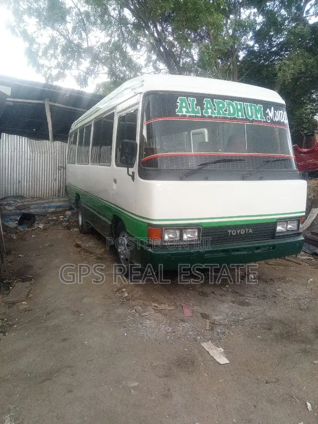 Toyota Coaster 2002 - White - 1