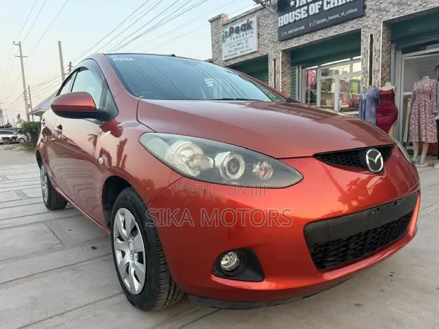 Mazda Demio 2009 Orange - 1