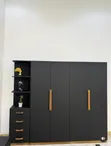 Modern Three-Door Wardrobe with Dressing Area - 1